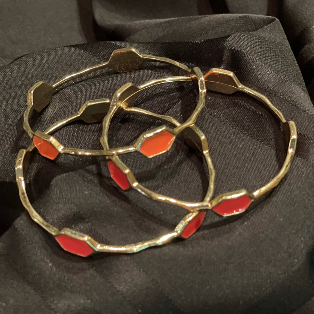 Gold tone set of 3 bangles w/orange stations